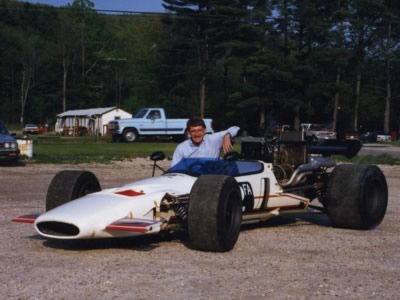 Mike Allison poses with his McLaren M10B at Lime Rock in 1988. Copyright Mike Allison 2010. Used with permission.