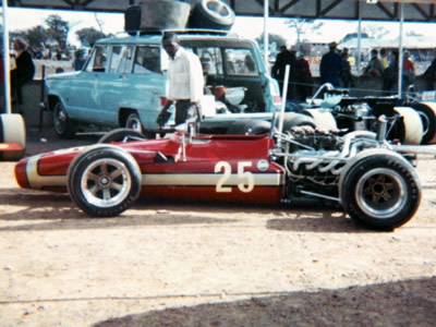 The Team Domingo T70/140 - or is it a T142 - in the paddock at the 1970 Bulawayo 100.  Note the lack of wings which would suggest it is not the ex-Charlton/Parnell SL140/14. Copyright Doug Brown 2005. Used with permission.