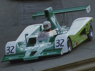 Charlie Kemp in his Sprite-liveried Lola T332 at Laguna Seca in 1979. Copyright Terry Capps 2014. Used with permission.