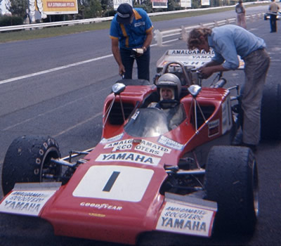 Frank Gardner in the works Lola T300 during practice for the 1972 Tasman series round at Sandown Park. Copyright Stewart Clark 2017. Used with permission.