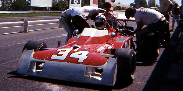 Sam Posey in his Surtees TS11 in the pits at Sandown Park in 1973.  Copyright Stewart Clark 2017. Used with permission.