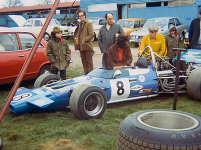 Ray Allen's McLaren M18 draws a crowd in the Mallory Park paddock in 1972. Copyright Stuart Dent 2004. Used with permission.