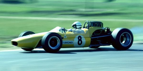 Frank Gardner in the Brabham BT23D with Alfa Romeo V8 engine at Warwick Farm in 1968.  Copyright John Ellacott 2008.  Used with permission.