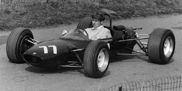 Roger Keele in Alan McKechnie's Cooper T83 at Castle Combe in 1967, showing the modification to outboard front springs and dampers. Copyright Ted Walker 2019. Used with permission.