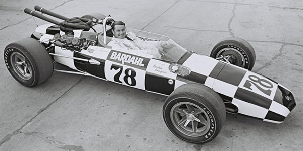 Jerry Grant's brand new Eagle displayed to the press prior to the 1968 Indianapolis 500. Part of the Dave Friedman collection. Licenced by The Henry Ford under Creative Commons licence Attribution-NonCommercial-NoDerivs 2.0 Generic. Original image has been cropped.