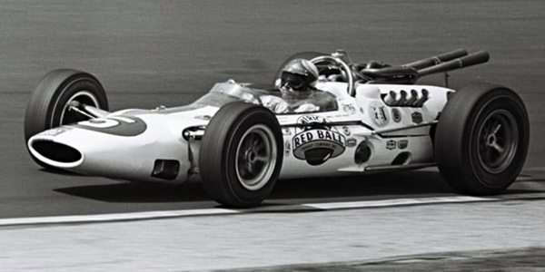 Bud Tingelstad in Lindsey Hopkins' Lola T80.  Part of the Dave Friedman collection. Licenced by The Henry Ford under Creative Commons licence Attribution-NonCommercial-NoDerivs 2.0 Generic. Original image has been cropped.
