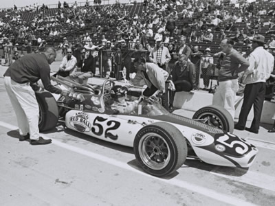 Lee Roy Yarbrough in the #52 Gene White Mongoose in the all too brief period before it was destroyed at Indy in 1967. Part of the Dave Friedman collection. Licenced by The Henry Ford under Creative Commons licence Attribution-NonCommercial-NoDerivs 2.0 Generic. Original image has been cropped.