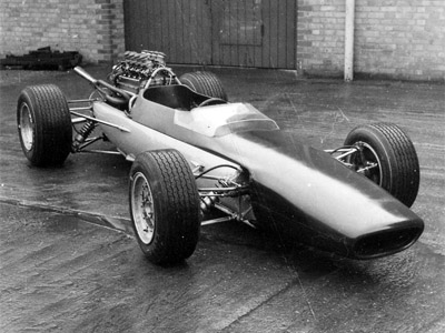 The prototype Lola T100 fitted with its BMW Apfelbeck engine at the Lola factory. Copyright Lola Heritage 2020. Used with permission.
