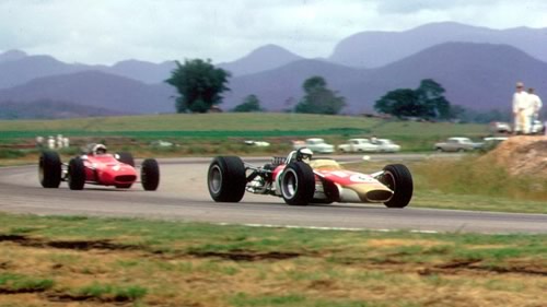 Jim Clark leads Chris Amon at Surfers Paradise in 1968.  Copyright Rod Mackenzie 2012.  Used with permission.