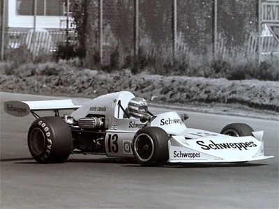 Gilles Villeneuve in his regular Schweppes Ecurie Canada March 74B at Trois-Rivières in 1974, showing its F2-style nose and (left hand) side radiator. Copyright Norm MacLeod 2018. Used with permission.