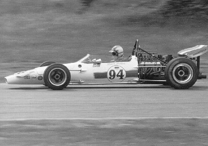 Eppie Wietzes in his McLaren M18 at Laguna Seca in 1971. Copyright Al Moore 2002. Used with permission.