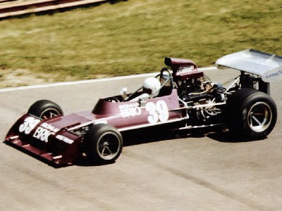 John Gunn's 73A in its Roman Brio livery at (probably) Mid-Ohio. Copyright Drake Moore 2004. Used with permission.