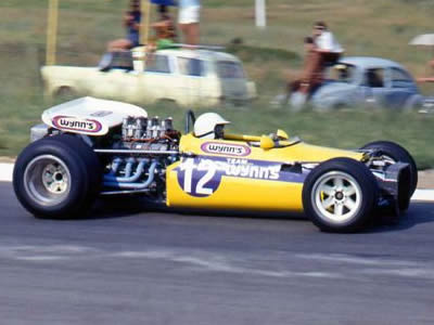 Spencer Schultze in a rather shortened version of the Wynns Lola T142 at Kyalami in 1971 after he tangled with Kipp Ackerman. Copyright David Pearson 2007. Used with permission.