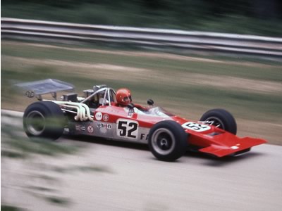 Pete Sherman in his #52 red Lola T192 at Road America in 1971. Copyright Richard A Reeves 2013. Used with permission.