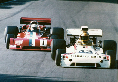 Teddy Pilette in the BDS Chevron B28 about to pass the ex-VDS Chevron B24 of Wunderink as they approach Shaws Corner, Mallory Park 1974. Copyright Mark Scanlon 2005. Used with permission. Teddy Pilette in the BDS Chevron B28 about to pass the ex-VDS Chevron B24 of Wunderink as they approach Shaws Corner, Mallory Park 1974. Copyright Mark Scanlon 2005. Used with permission.
