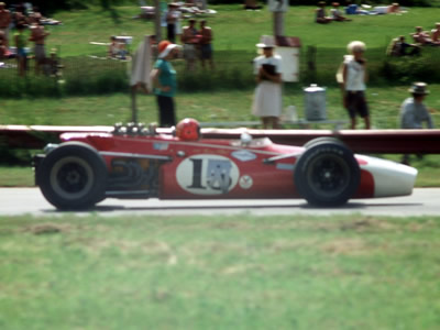 Brian O'Neill's red Lola T140 in the Badger 200 at Road America in 1968. Copyright Tom Schultz 2006. Used with permission.