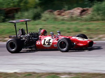 Bud Morley's fabulous red T142 at Road America in July 1969. Copyright Tom Schultz 2006. Used with permission. Bud Morley's fabulous red T142 at Road America in July 1969. Copyright Tom Schultz 2006. Used with permission.