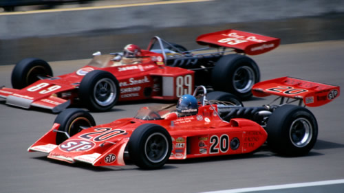 Gordon Johncock in the Patrick Racing Eagle 74 passes the earlier McLaren M16 of John Martin at Indianapolis in 1974. Copyright Glenn Snyder 2009. Used with permission. Gordon Johncock in the Patrick Racing Eagle 74 passes the earlier McLaren M16 of John Martin at Indianapolis in 1974. Copyright Glenn Snyder 2009. Used with permission.