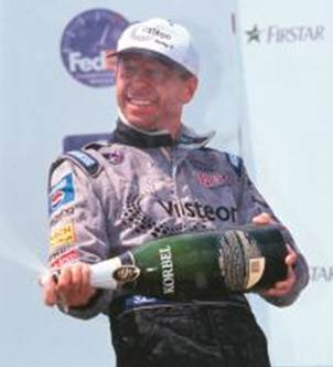 Roberto celebrates after winning at Cleveland in 2000.