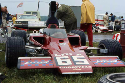The works-modified #65 Lola T330 HU14 at Mid-Ohio in 1973. Copyright Mark Windecker 2004. Used with permission.