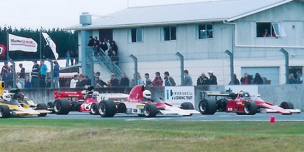 The cars line up for the start of the 2004 Classic Speed Fest, with Mike Wrigley's #97 Lola on pole and Murray Sinclair's Lola T332 alongside. Copyright Kevin Thomson 2004. Used with permission. The cars line up for the start of the 2004 Classic Speed Fest, with Mike Wrigley's #97 Lola on pole and Murray Sinclair's Lola T332 alongside. Copyright Kevin Thomson 2004. Used with permission.