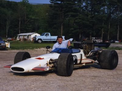 Mike Allison poses with his McLaren M10B at Lime Rock in 1988. Copyright Mike Allison 2010. Used with permission.
