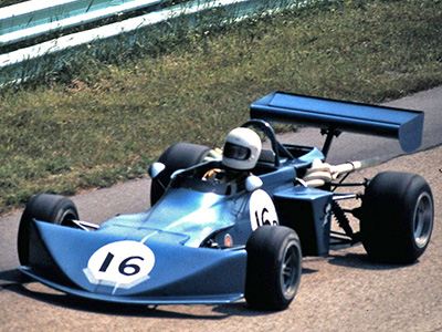 Cliff Phillips in his updated March 722 at Road America in 1975. Copyright Pepper Bowe 2020. Used with permission.