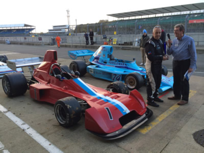 Neil Glover is interviewed after his debut win in the Chevron B37 at Silverstone 18 October 2014. Copyright Allen Brown 2014. Used with permission.