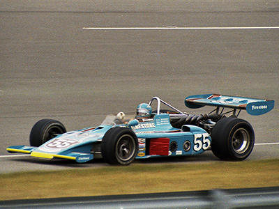 Lee Kunzman in the Cobre Tire 1973 Eagle at Michigan in September 1973. Copyright Paul Castagnoli 2020. Used with permission. Lee Kunzman in the Cobre Tire 1973 Eagle at Michigan in September 1973. Copyright Paul Castagnoli 2020. Used with permission.