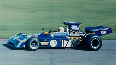 Tony Dean in his older B24 at Aintree in April 1975.  Note the rear-facing roll hoop stays which identify this as an early B24. Copyright Alan Cox 2006. Used with permission.