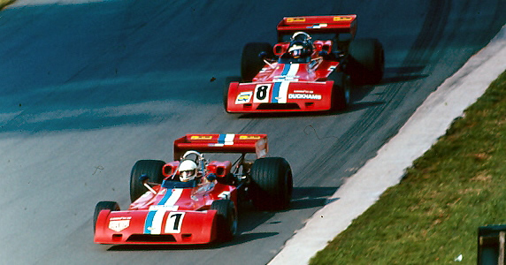 Teddy Pilette leads Peter Gethin in the twin Chevron B28s at Mallory Park in 1974. Copyright Alan Cox 2007. Used with permission.