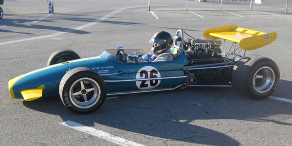 Peter Strauss's Brabham BT31 in April 2011.  The low rear wing is required as the car's origianl high wing was outlawed later in 1969. Licenced by Wikipedia user 'GTHO' under Creative Commons licence Attribution-ShareAlike 3.0 Unported (CC BY-SA 3.0). Original image has been cropped.