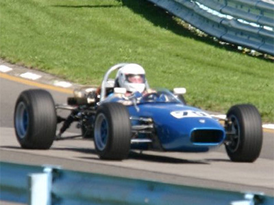 Ed Mangone in his Crosslé 12F at the 2004 Zippo Grand Prix at Watkins Glen in 2004. Licenced by Nathan Bittinger under Creative Commons licence Attribution 2.0 Generic (CC BY 2.0). Original image has been cropped.
