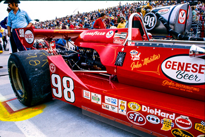 John Martin's #98 Agajanian/King Dragon at the 1976 Indy 500. Copyright Richard Deming 2016. Used with permission. John Martin's #98 Agajanian/King Dragon at the 1976 Indy 500. Copyright Richard Deming 2016. Used with permission.
