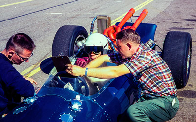 Gordon Johncock testing his new 1966/67 Gerhardt at Phoenix prior to the 1967 season.  Note the riveted section as far as the front of the cockpit, then a cockpit surround held by Dzus fasteners. Copyright Richard Deming 2017. Used with permission.