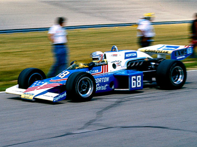 Tom Sneva in the Norton Spirit McLaren M16C at Michigan in 1976. Copyright Richard Deming 2016. Used with permission.