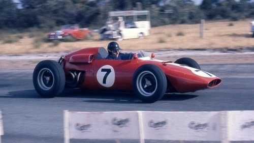 The unusual sight of a red BRM as Arnold Glass wrestles his Buick-powered BRM P48 round Warwick Farm at the 1962 Australian GP. Copyright Ken Devine 2011. Used with permission. The unusual sight of a red BRM as Arnold Glass wrestles his Buick-powered BRM P48 round Warwick Farm at the 1962 Australian GP. Copyright Ken Devine 2011. Used with permission.