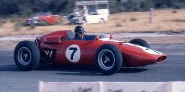 The unusual sight of a red BRM as Arnold Glass wrestles his Buick-powered BRM P48 round Warwick Farm at the 1962 Australian GP.  Copyright Ken Devine 2011.  Used with permission.