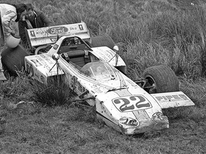 Terry Sanger examines the damage to the Harrier 001 after its accident at Mallory Park in March 1971. Copyright Mike Dodman 2025. Used with permission.