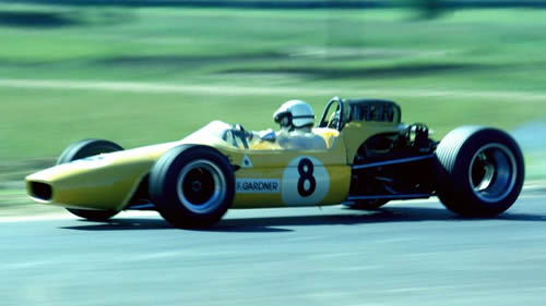 Frank Gardner in the Brabham BT23D with Alfa Romeo V8 engine at Warwick Farm in 1968. Copyright John Ellacott 2008. Used with permission.