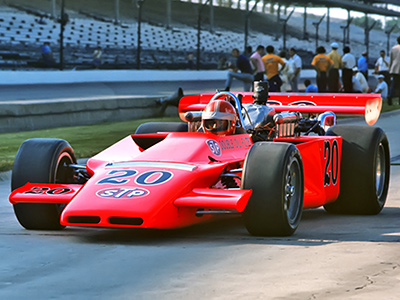 STP's rebodied McNamara T500 with Dick Simon driving during practice for the 1972 Indy 500. Copyright First Turn Productions LLC 2022. Used with permission.