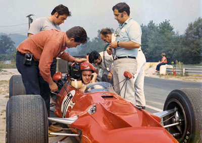 Scooter Patrick in Garner's TS5 at St Jovite in 1969. Around the car are chief crew Max Kelly, Rob Fischetti and three of Garner's film crew. Copyright Rob Fischetti 2005. Used with permission. Scooter Patrick in Garner's TS5 at St Jovite in 1969. Around the car are chief crew Max Kelly, Rob Fischetti and three of Garner's film crew. Copyright Rob Fischetti 2005. Used with permission.