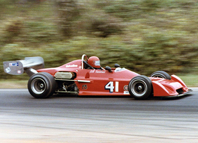 Bill Kneeland's Chevron B39 at the SCCA Runoffs in 1977. Copyright Peter Viccary (<a href='http://www.gladiatorroadracing.ca/' target='_blank'>gladiatorroadracing.ca</a>) 2021. Used with permission.