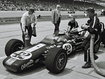 Denny Hulme in his AAR Eagle during the 1968 Indy 500. Part of the Dave Friedman collection. Licenced by The Henry Ford under Creative Commons licence Attribution-NonCommercial-NoDerivs 2.0 Generic. Original image has been cropped.