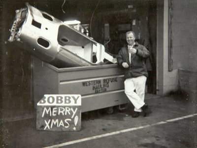 Tom Herrmann with the Eagle monocoque damaged by Bobby Unser in a test at Riverside in December 1968. Copyright From the Collections of The Henry Ford. Gift of Bobby Unser. Used with permission.