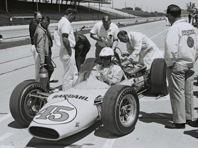The 1964 Gerhardt in the pit lane during practice for the 1964 Indianapolis 500. Part of the Dave Friedman collection. Licenced by The Henry Ford under Creative Commons licence Attribution-NonCommercial-NoDerivs 2.0 Generic. Original image has been cropped. The 1964 Gerhardt in the pit lane during practice for the 1964 Indianapolis 500. Part of the Dave Friedman collection. Licenced by The Henry Ford under Creative Commons licence Attribution-NonCommercial-NoDerivs 2.0 Generic. Original image has been cropped.