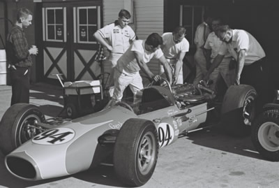 The 1965 Gerhardt house car is prepared in the Indianapolis paddock.  Part of the Dave Friedman collection. Licenced by The Henry Ford under Creative Commons licence Attribution-NonCommercial-NoDerivs 2.0 Generic. Original image has been cropped.