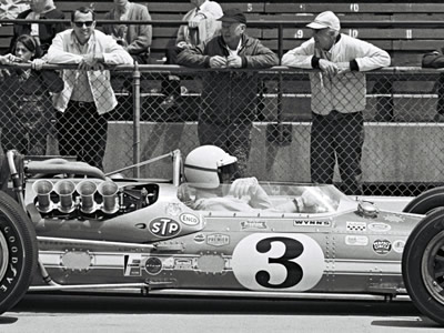 Gordon Johncock in his #3 Gilmour Broadcasting Gerhardt at the 1967 Indy 500. The Dzus fasteners are still visible in this picture. Part of the Dave Friedman collection. Licenced by The Henry Ford under Creative Commons licence Attribution-NonCommercial-NoDerivs 2.0 Generic. Original image has been cropped. Gordon Johncock in his #3 Gilmour Broadcasting Gerhardt at the 1967 Indy 500. The Dzus fasteners are still visible in this picture. Part of the Dave Friedman collection. Licenced by The Henry Ford under Creative Commons licence Attribution-NonCommercial-NoDerivs 2.0 Generic. Original image has been cropped.