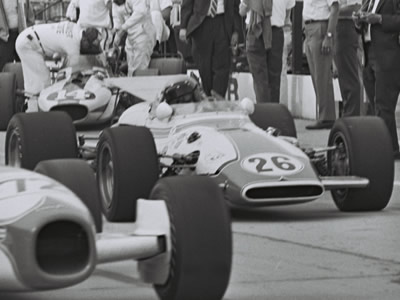 This front view of the Bulldog Stables #26 car at the 1969 Indy 500 shows its outboard front springs. Part of the Dave Friedman collection. Licenced by The Henry Ford under Creative Commons licence Attribution-NonCommercial-NoDerivs 2.0 Generic. Original image has been cropped.