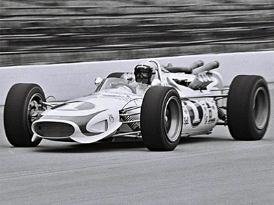 Mario Andretti in the 1967 Hawk II at the Indy 500 in 1967. Licenced by The Henry Ford under Creative Commons licence Attribution-NonCommercial-NoDerivs 2.0 Generic. Original image has been cropped. Mario Andretti in the 1967 Hawk II at the Indy 500 in 1967. Licenced by The Henry Ford under Creative Commons licence Attribution-NonCommercial-NoDerivs 2.0 Generic. Original image has been cropped.